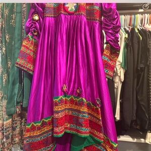 Bright purple Afghan dress with colorful embroidery and sequins perfect for Eid